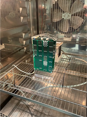 A variety of MLI sensors on boards in a testing chamber