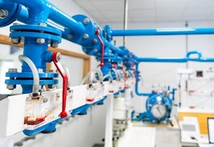 Low pressure flow calibration facility