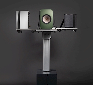 Grey, green and black speakers mounted on metal Low Noise Rapid Speaker Spinners stand